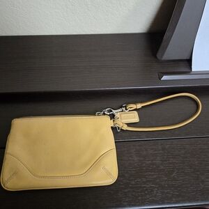 Coach yellow leather wristlet